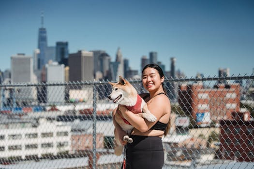 A happy Shiba Inu owner with their pet